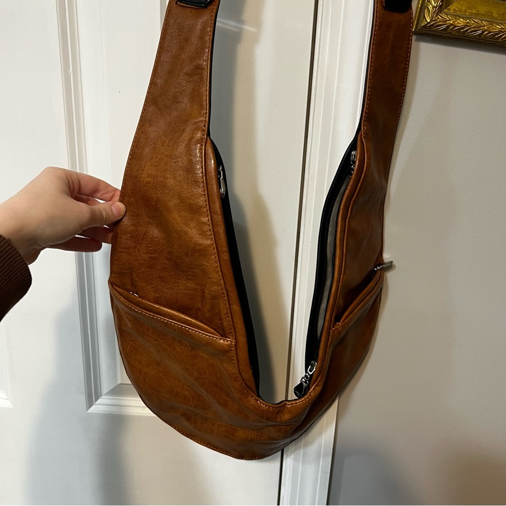 Sash crossbody bag, reversible black & brown vegan leather, like new condition